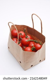 Cherry Tomatoes In A Small Brown Paper Bag