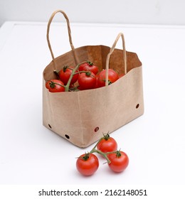 Cherry Tomatoes In A Small Brown Paper Bag