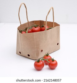 Cherry Tomatoes In A Small Brown Paper Bag