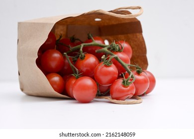 Cherry Tomatoes In A Small Brown Paper Bag