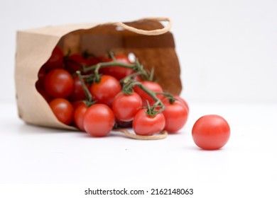 Cherry Tomatoes In A Small Brown Paper Bag