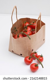 Cherry Tomatoes In A Small Brown Paper Bag