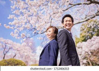 A Cherry Tree And Asian Office Worker