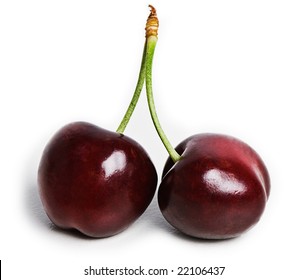 Cherry. Two Dark Red Cherries Joined By The Stem. Isolated On White.