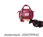 Cherry-Charm Red Handbag, A Stylish Accessory with a Heart Clasp and Playful Cherry Keychain, perfect for adding a pop of color and fun to your outfit,