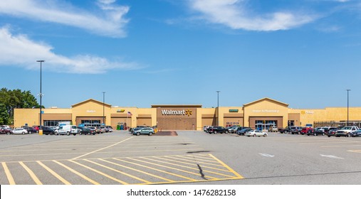 CHERRYVILLE, NC, USA-9 AUGUST 2019: A Walmart Superstore and the parking lot with cars.