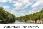 The Chesapeake and Ohio canal becomes wide and flat near Great Falls where locks control the amount of water flowing into the canal bed. 