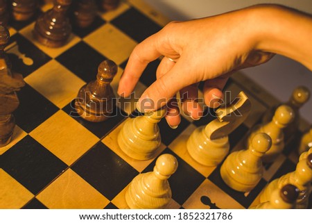 Similar – Image, Stock Photo Boy of primary school age plays chess