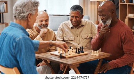 Chess, friends and board games on wooden table thinking of strategic or tactical move at home. Senior group of men playing and holding or moving white piece for attack in game of skill and tactics - Powered by Shutterstock