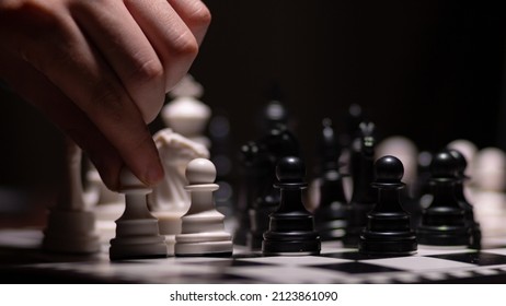 Chess Game Close Up With Hand

