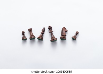 Chess Game Figures On White Background , Top View, Flat Lay