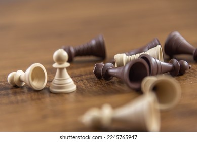 Chess game pieces on wooden background. Reasoning strategy game. Fun and competitiveness. - Shutterstock ID 2245765947