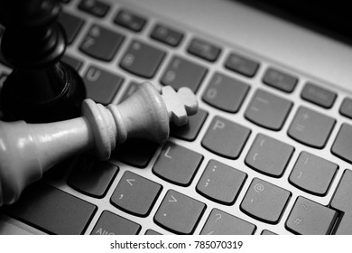 Chess Kings On Laptop Keyboard - Digital Strategy