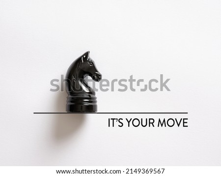 Chess knight or horse with the message it's your move. Taking action, strategy, decision and challenge in business concept.