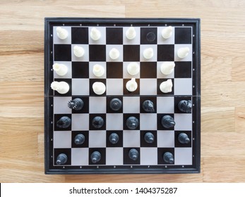 Chess On Wooden Table, Top View 