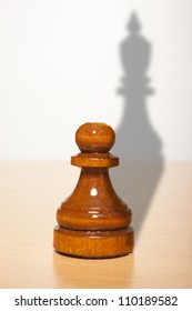 Chess Pawn With The Shadow Of A King