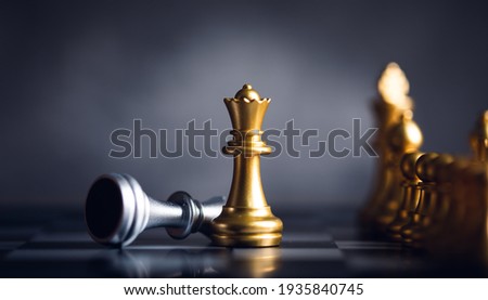  chess piece stand in front of pawn on black background