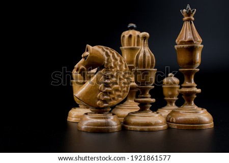 Chess Pieces in Dim Light