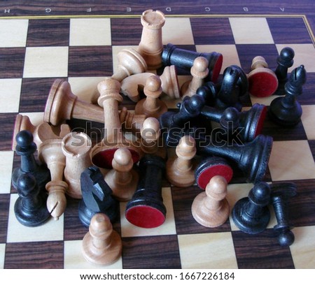 Chess pieces in disarray on the chessboard