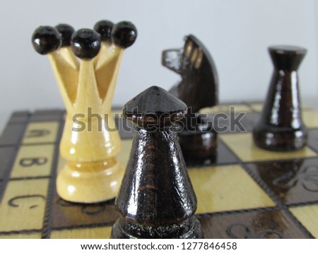 Chess pieces on board white background