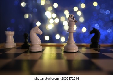 Chess Pieces, Queen In Crown White And Black On A Chessboard, Concept Of Leadership And Teamwork In Business, Duel, Opposition Of Light And Dark Forces, Sports Game