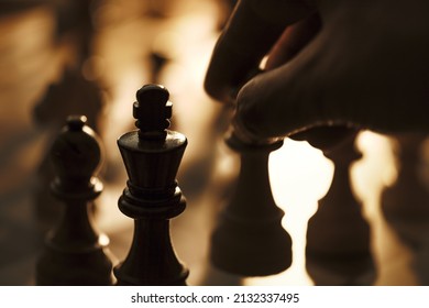 Chess Player Moving A Piece On The Chessboard, Hand Close Up