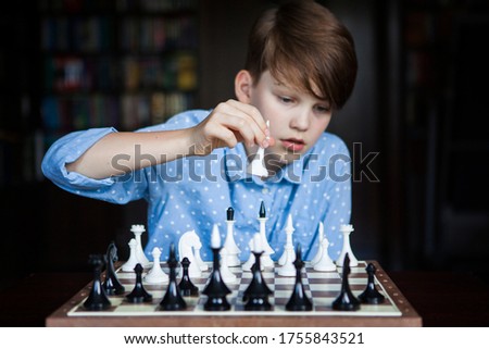 Chess player, smart boy. Logical thinking. Quarantine Games. Chess.