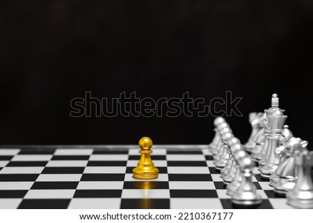 Chess Single pawn stand alone against many enemies as a symbol of difficult unequal fight or struggle of minorities confidence concept.