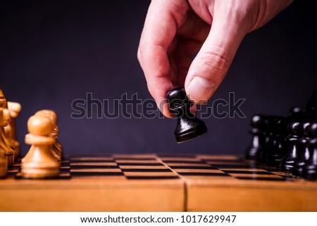 Chess. Strategy game. Competition success play. Intelligence challenge concept. King move on chessboard. White and black pawn on board. Business leadership. Leisure sport.