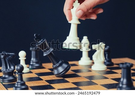 the chessboard captures the decisive moment of checkmate, symbolizing a strategic victory in a business context. The image conveys themes of strategic planning, and competitive success.