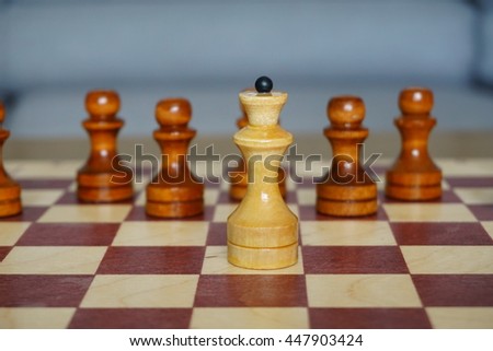 Chessboard and game of chess. The queen, rook, pawn, knight.