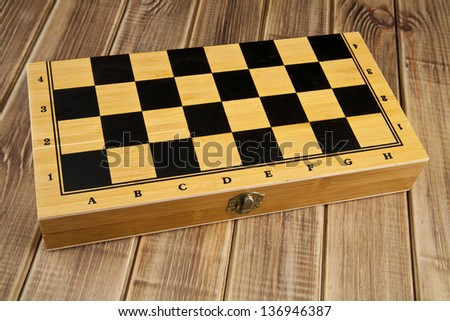 chess-board on a wooden background