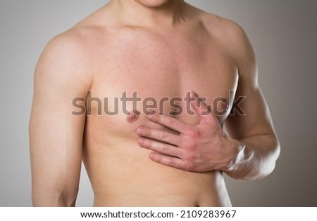 Chest pain. The man's chest hurts.
