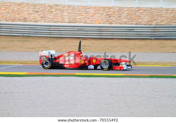CHESTE,\
SPAIN - FEBRUARY 1: Formula 1 in Cheste (Spain) - Ferrari F1 Team\
driver Fernando Alonso in 2011 first official training day on\
February 1, 2011 in Cheste (Valencia),\
Spain
