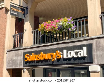 Chester, Cheshire, England - July 2021: Sign Above The Entrance To A Branch Of Sainsburys Local.