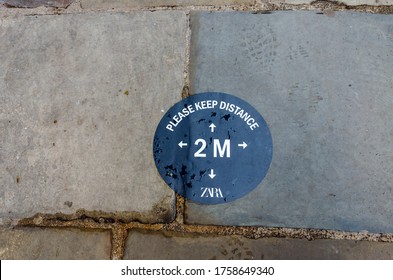 Chester, UK: Jun 14, 2020: A Customised Social Distancing Marker On The Pavement Has Been Branded By Zara Clothing Retailers.