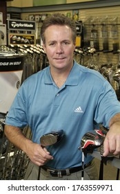 CHESTERFIELD, UNITED STATES - Jan 30, 2009: A Golf Pro Holding Clubs In A Pro Shop In Missouri