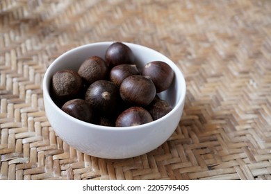 Chestnuts In Bowl On Rattan Mat. Healthy Food.