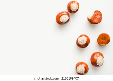Chestnuts on a white background. Chestnut fruits.