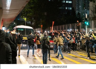 Cheung Sha Wan, Hong Kong- 02-12-20: The prison van was surrounded by supporters of Joshua, Agnes, and Ivan. Shouting slogans like ”No rioters, only tyranny” and tell them to stay strong.