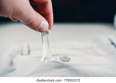 Chewing Gum Stuck To Jeans Closeup, Removal Of Chewing Gum From Pants