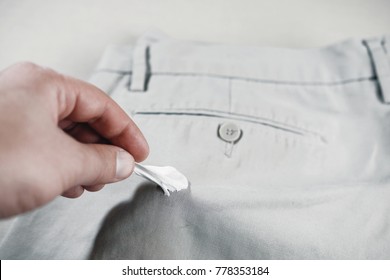 Chewing Gum Stuck To Jeans Closeup, Removal Of Chewing Gum From Pants