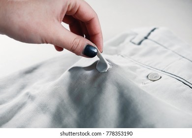 Chewing Gum Stuck To The Jeans Closeup, Removal Of Chewing Gum From Pants