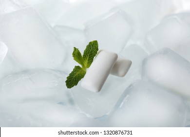 Chewing Gums And Mint On Ice Cubes, Closeup