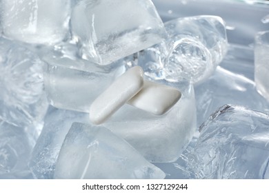 Chewing Gums On Pile Of Ice Cubes, Closeup