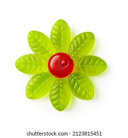 Chewy Candy Flower Of Red Green Colors Isolated On A White Background. Tasty Gummy Sweets Arranged In A Flower Shape Cutout. Candy Made Of Fruit Juice, Sugar And Gelatin. Fruit Chews Concept. Top View