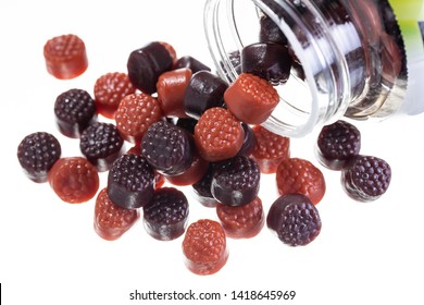 Chewy Gummy Multivitamins In A Spilled Bottle