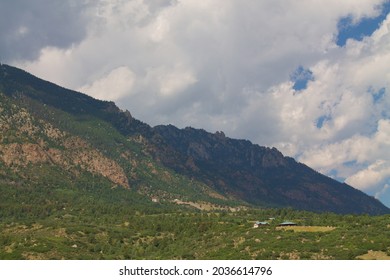 Cheyenne Mountain And Huge Clouds On Top 