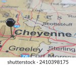 Cheyenne, Wyoming marked by a black map tack.  The City of Cheyenne is the capital of of the state and the county seat of Laramie County, WY.