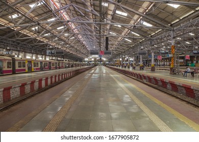 Chhatrapati Shivaji Maharaj Terminus, Mumbai, Maharashtra / India - 03 08 2020 Corona Covid - 19 Virus Effect On CSMT Railway Station Mumbai People Using Mask Empty Railway Station  Curfew In Mumbai